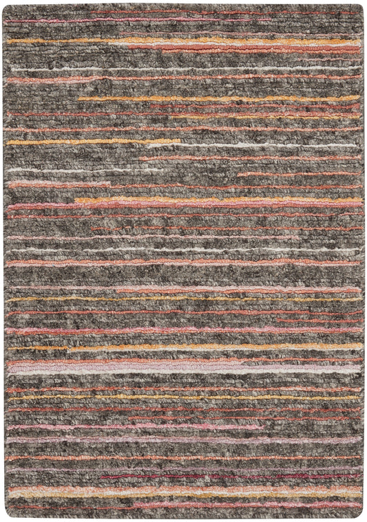Gray tufted rug with subtle multicolor horizontal stripes in pink, orange, and yellow; soft, shaggy pile.