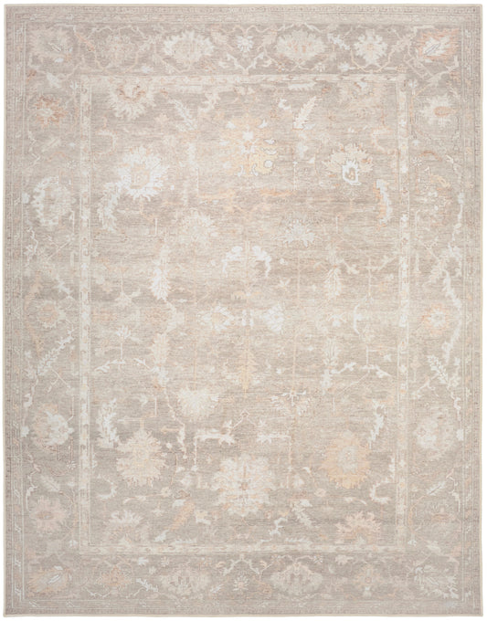 Rectangular beige distressed oriental rug with subtle floral medallion and border in cream-taupe tones.