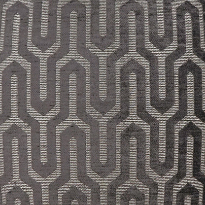 Pillow in gray woven fabric with a light beige interlocking chain-link geometric pattern; upholstery-grade texture.