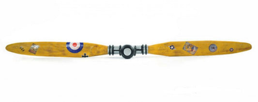 Yellow wooden aircraft propeller with RAF roundel decals and a central black hub.