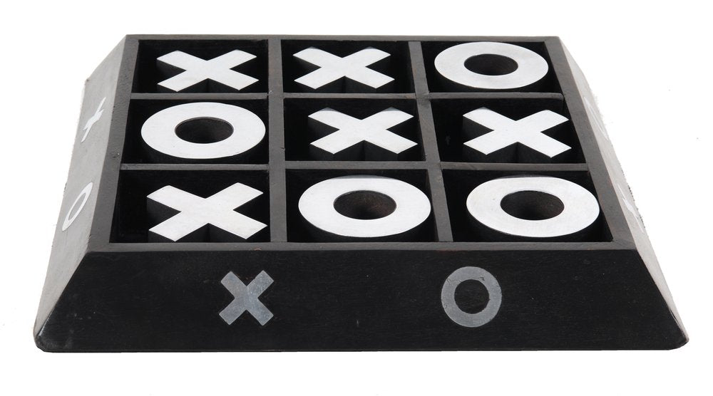 Nickel and dark wood tic-tac-toe game sculpture with a black grid and white X and O tokens, shown at an angled perspective.