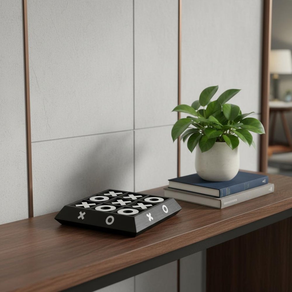 Wooden shelf with a black tic-tac-toe game (X/O) and a potted green plant on stacked books.