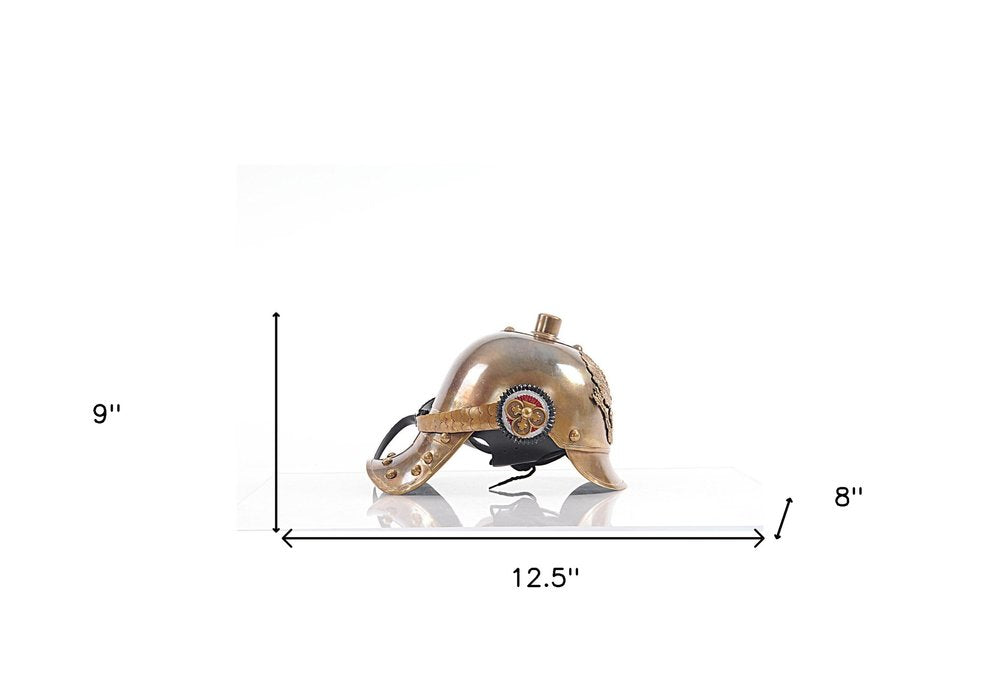 Brass-toned steampunk helmet with rivets, gear emblem and chin strap; decorative cosplay/display piece.