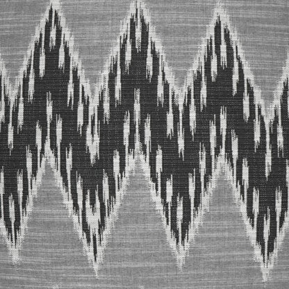 Grey fabric pillow with bold black chevron pattern; geometric weave, ideal for decor accents.