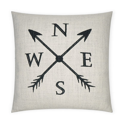 Beige linen-look throw pillow with a black compass rose made of crossing arrows showing N, S, E, W.