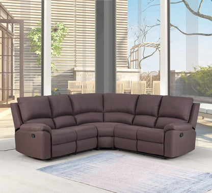 Dark brown curved fabric sectional sofa with plush cushions in a modern living room with large glass windows.
