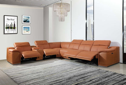 Orange leather sectional sofa with reclining seats in a modern living room; gray striped rug and large windows.