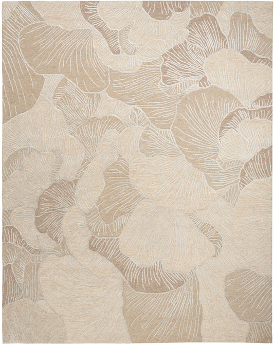 Neutral beige area rug with oversized cream and taupe botanical leaf pattern; woven texture, modern natural style.