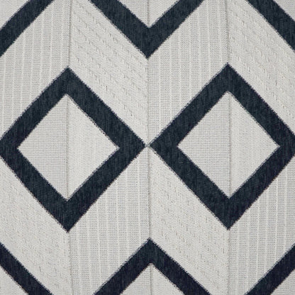 Beige knit fabric with navy chevron-diamond pattern; textured vertical ribbing and geometric look.