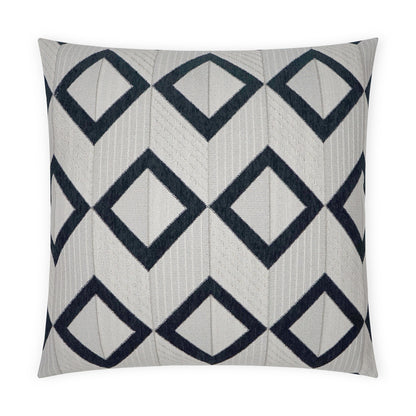 Navy diamond-outline patterns on light gray knit pillow; geometric modern decor accent.