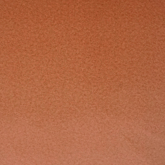 Rust-orange suede fabric swatch with soft nap