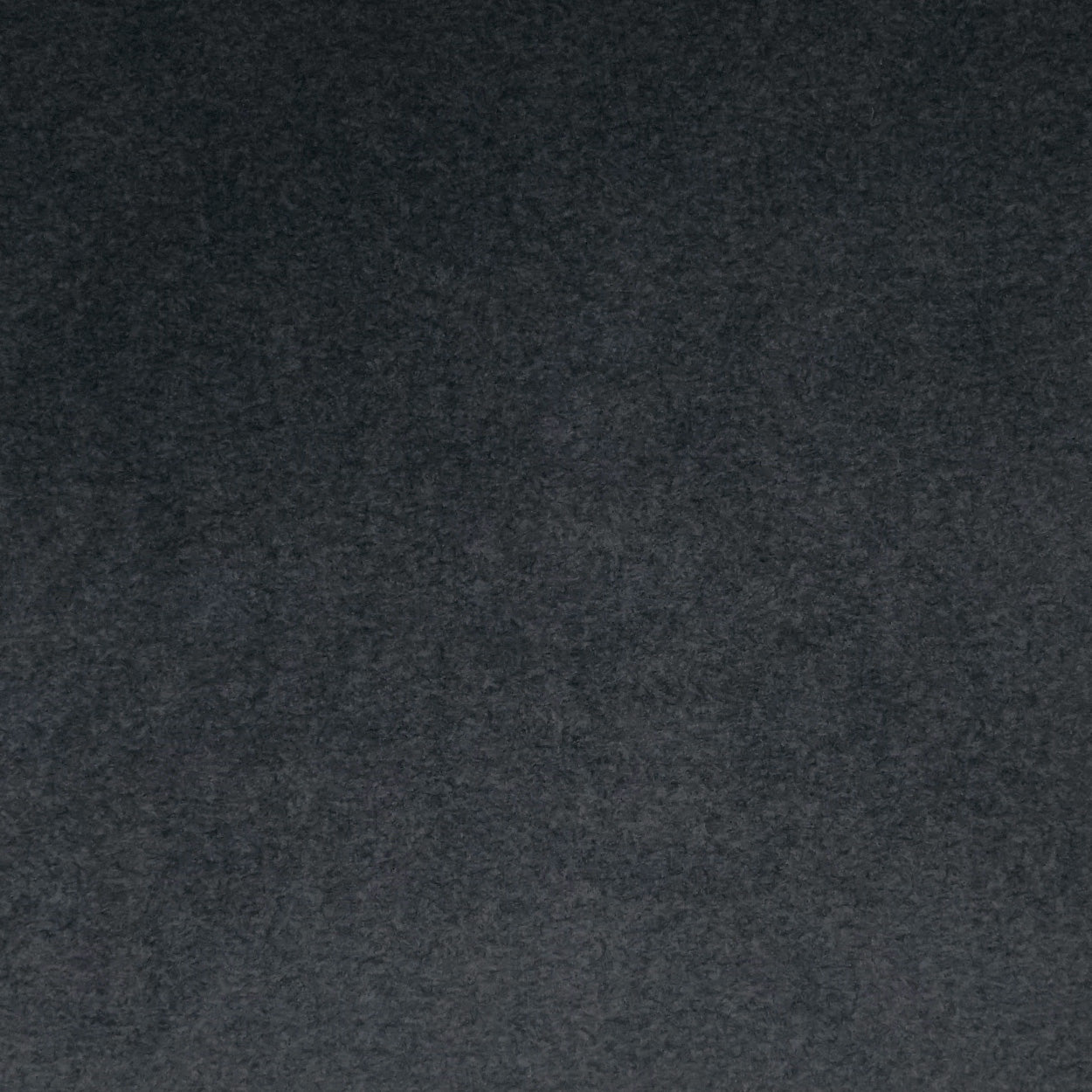 Dark charcoal fabric texture close-up; soft, matte textile suitable for upholstery or apparel.