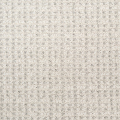 Cream waffle-knit fabric with a soft, cozy weave; light beige tone for blankets or sweaters.