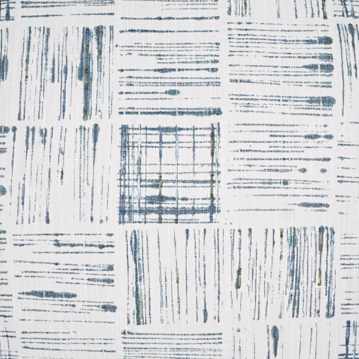 Blue and white patchwork fabric with striped and grid patterns, quilt-like textile suitable for throws or upholstery.