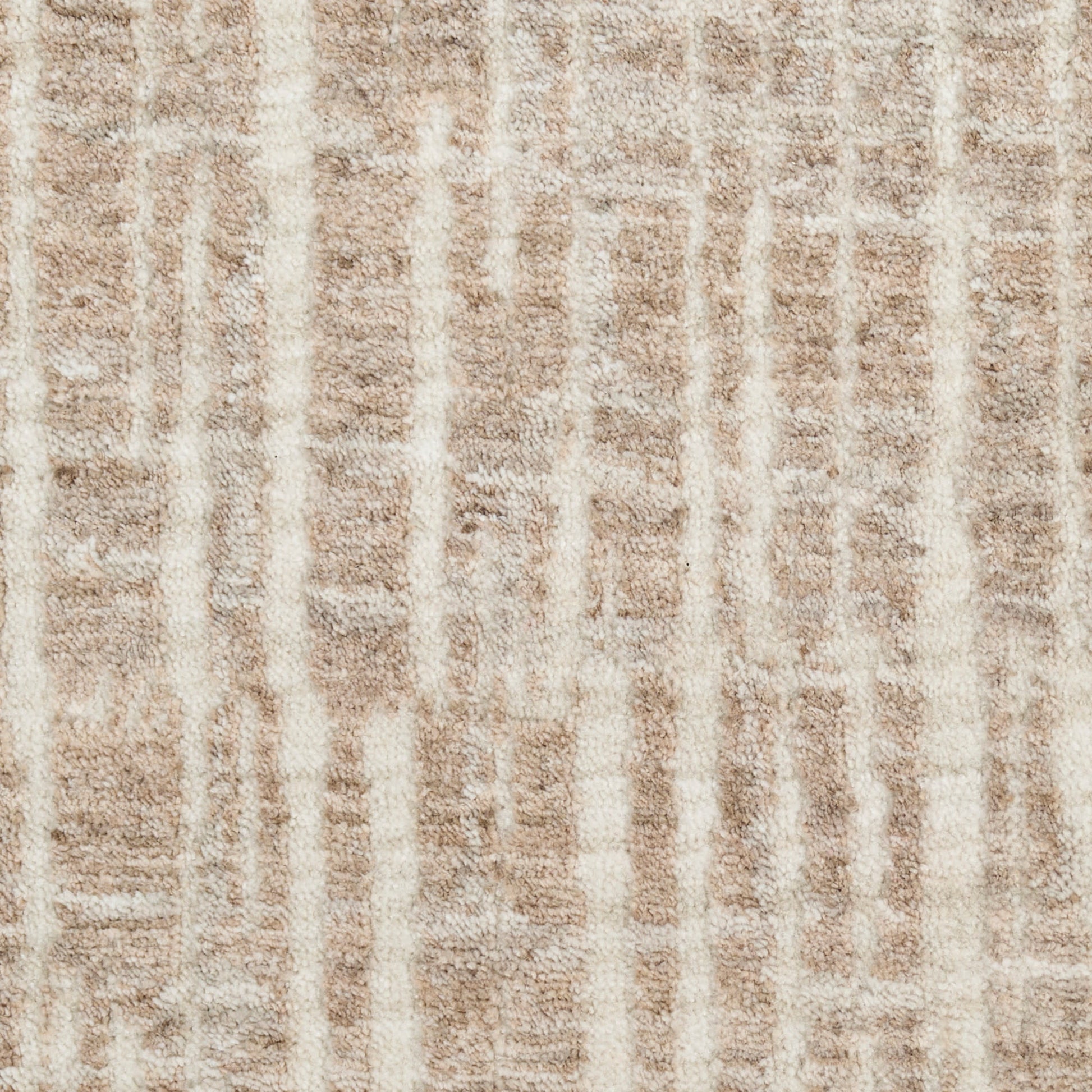 Beige shag rug with cream vertical stripes; soft, textured pile for modern living spaces.