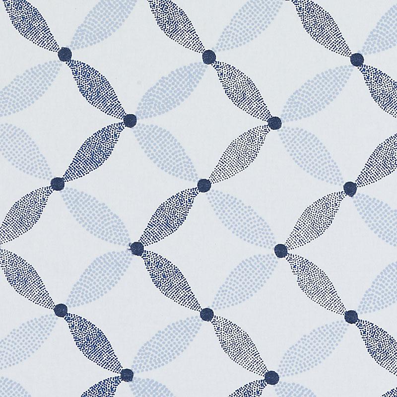Repeating lattice motif of navy and light-blue dotted ovals forming interlocking circles on white fabric.