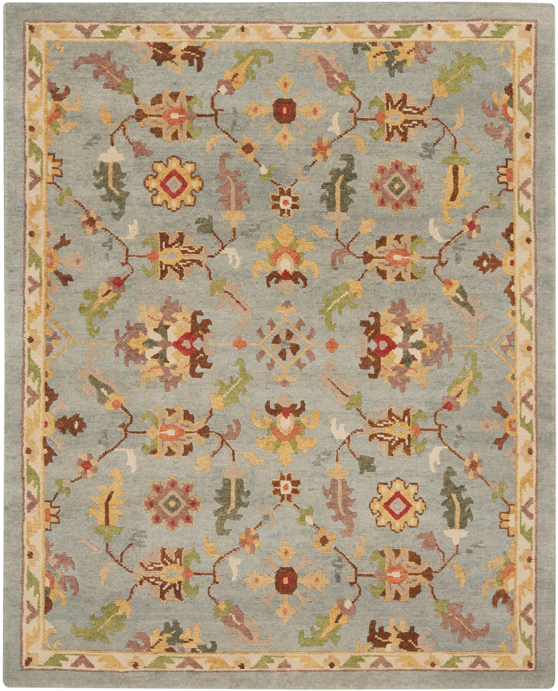 Blue-gray oriental rug with intricate multicolor floral arabesque pattern and pale cream border.