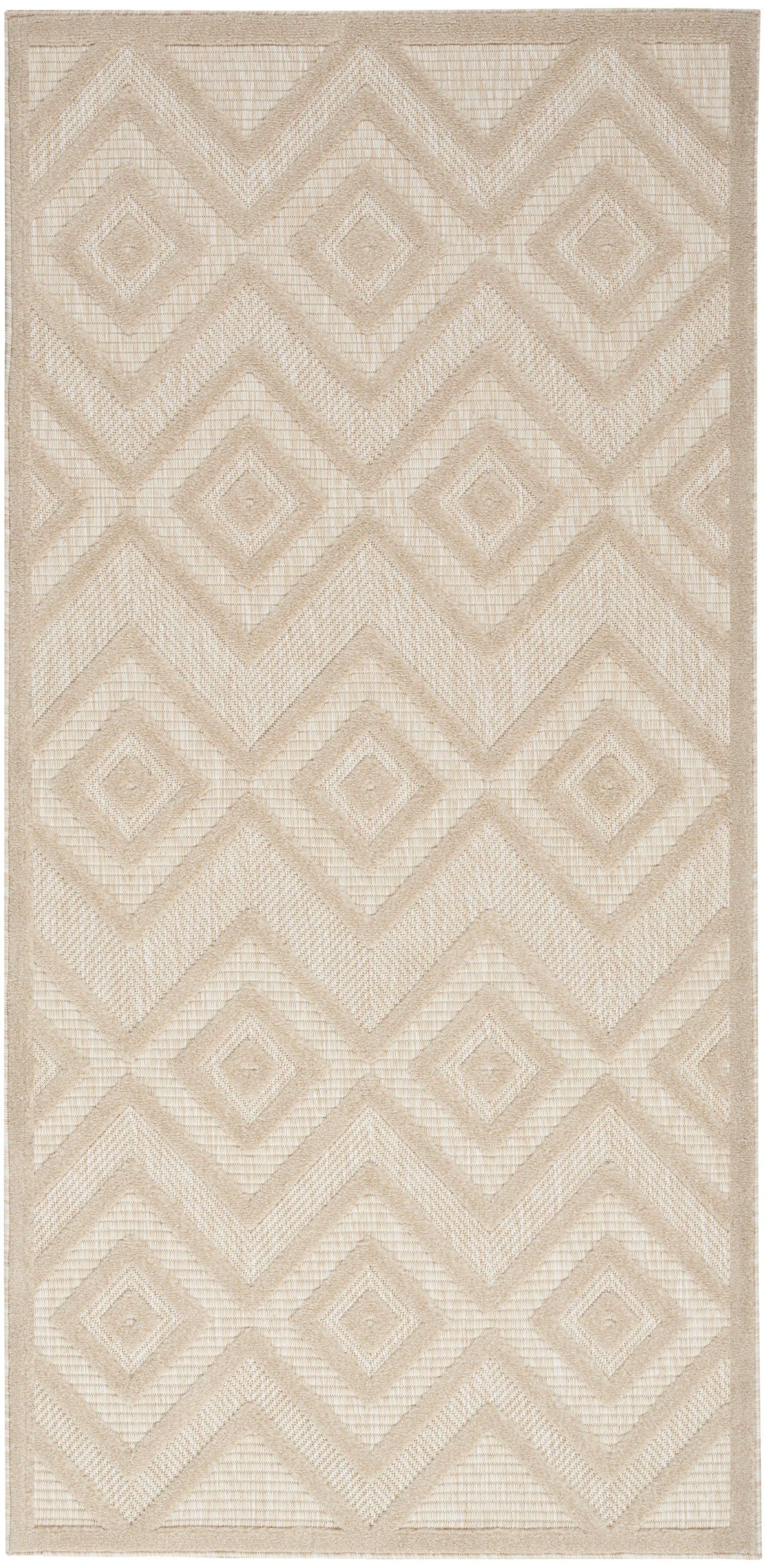 Beige woven rug with diamond/chevron geometric pattern; textured natural fiber, rectangular.