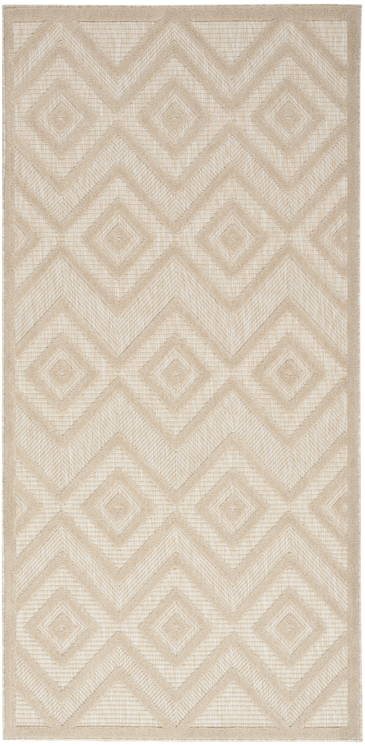 Beige woven rug with diamond/chevron geometric pattern; textured natural fiber, rectangular.
