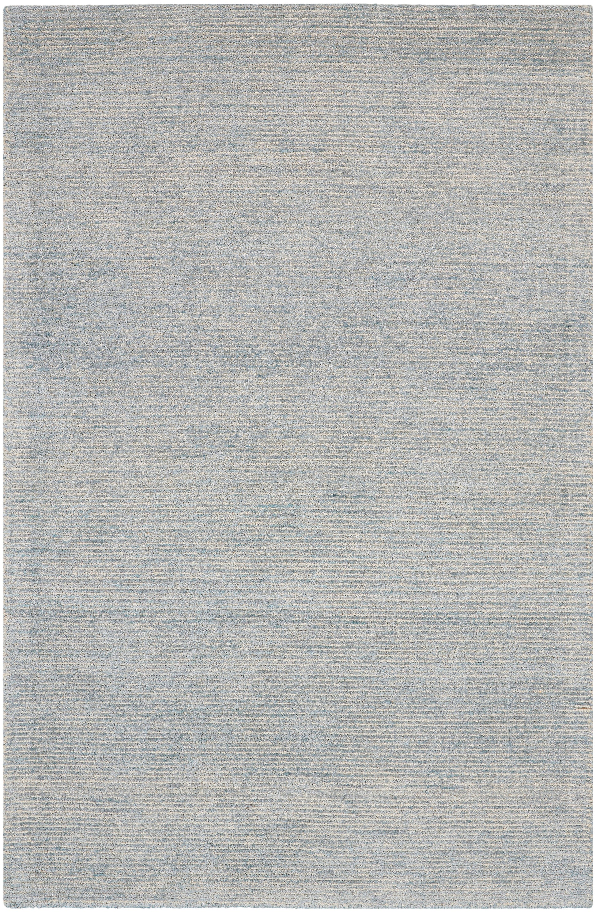 Rectangular light blue-gray rug with subtle woven texture and modern, muted tones.