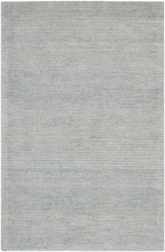 Rectangular light blue-gray rug with subtle woven texture and modern, muted tones.