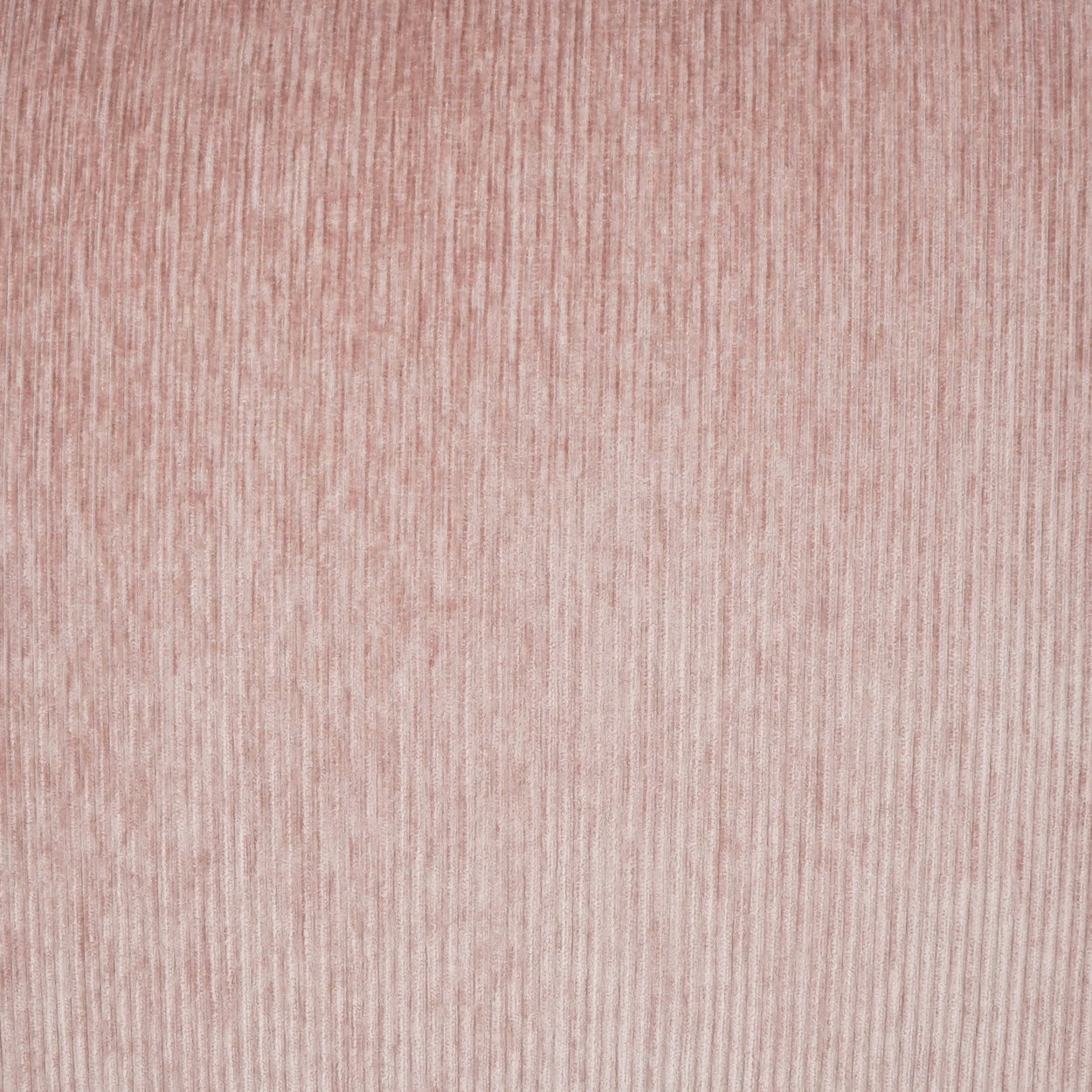 Dusty pink corduroy fabric with vertical ribbed texture.