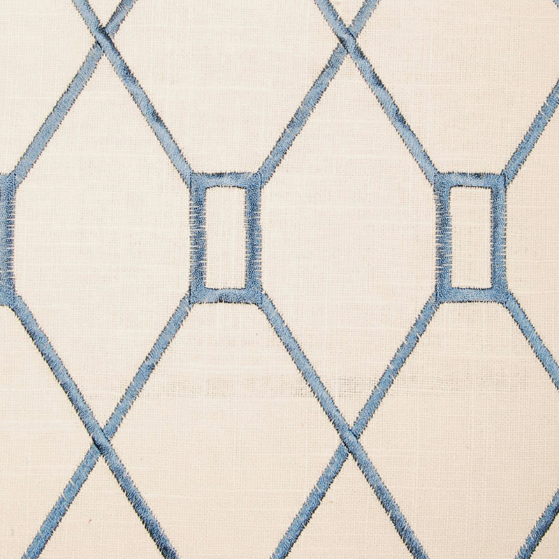 Beige upholstery fabric with a pale blue diamond trellis pattern and small rectangular accents at the intersections.