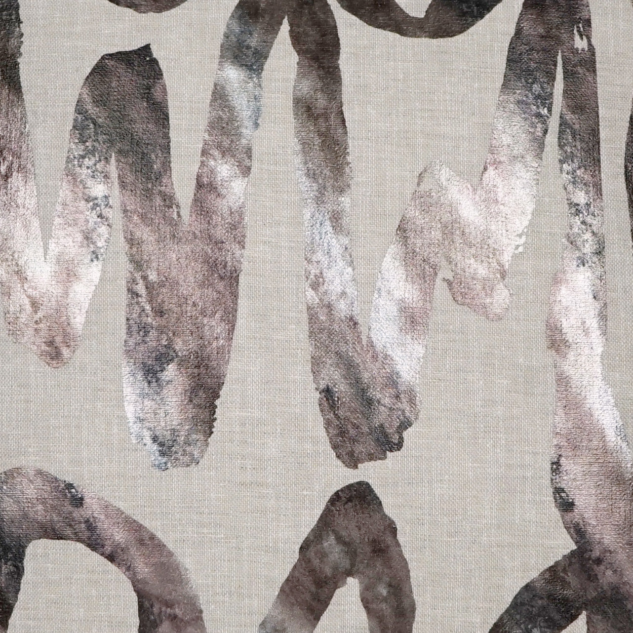 Beige linen fabric with dark gray-brown abstract brushstrokes for a modern, artsy textile.