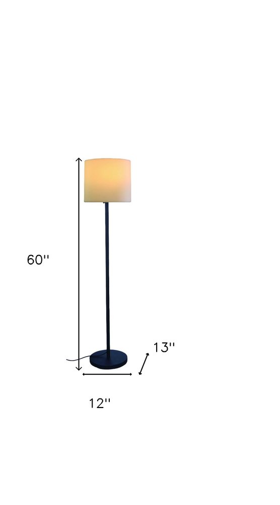 Blue floor lamp with slim metal stem, round 12" base, 60" tall, beige drum shade for warm ambient lighting.
