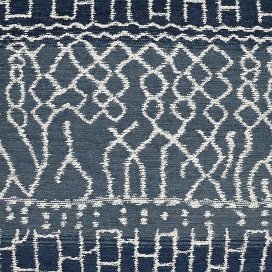 Navy blue fabric with white embroidered geometric lattice pattern and narrow border bands, decorative textile for upholstery.