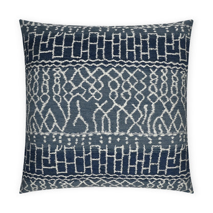 Navy blue square decorative pillow with white geometric woven pattern and textured fabric.