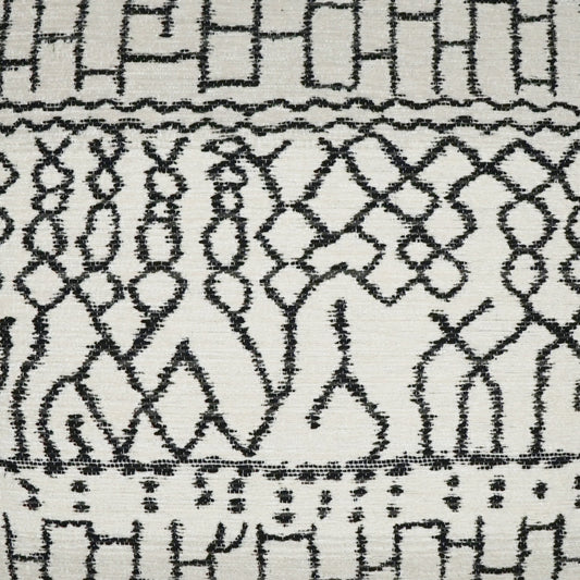 White fabric with black geometric tribal pattern featuring diamond lattice and arch motifs; textured weave.