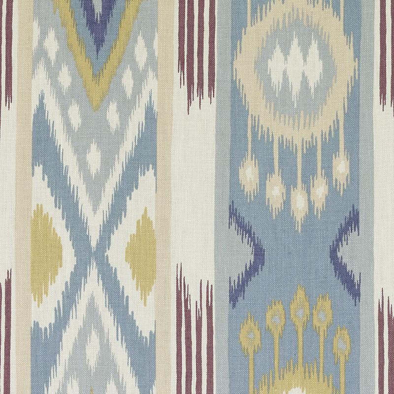 Woven ikat textile with blue and cream chevrons and circular medallions in mustard; vertical panels; rug/throw fabric.
