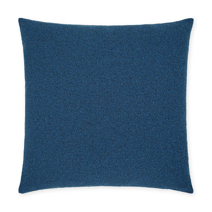 Deep blue square throw pillow in textured boucle fabric for modern home decor.
