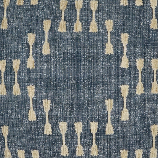 Blue textured fabric with cream tassel-like shapes in vertical, repeating pattern; boho-inspired textile.