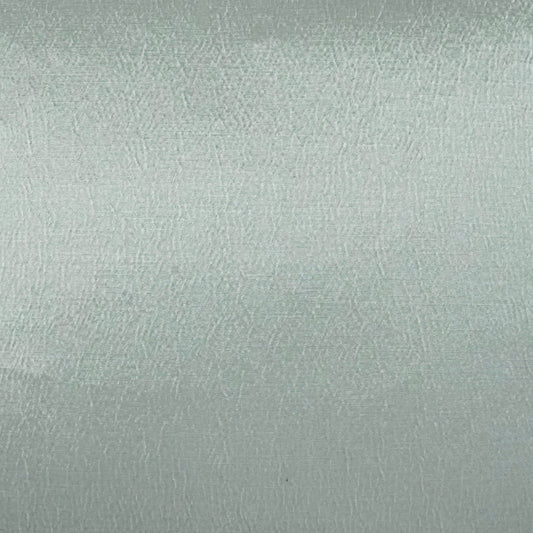 Light gray-blue fabric texture with subtle crosshatch weave; soft matte finish for upholstery or garments.