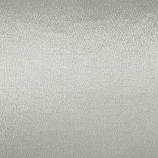 Close-up of light beige textured fabric with subtle weave, ideal for upholstery or apparel.