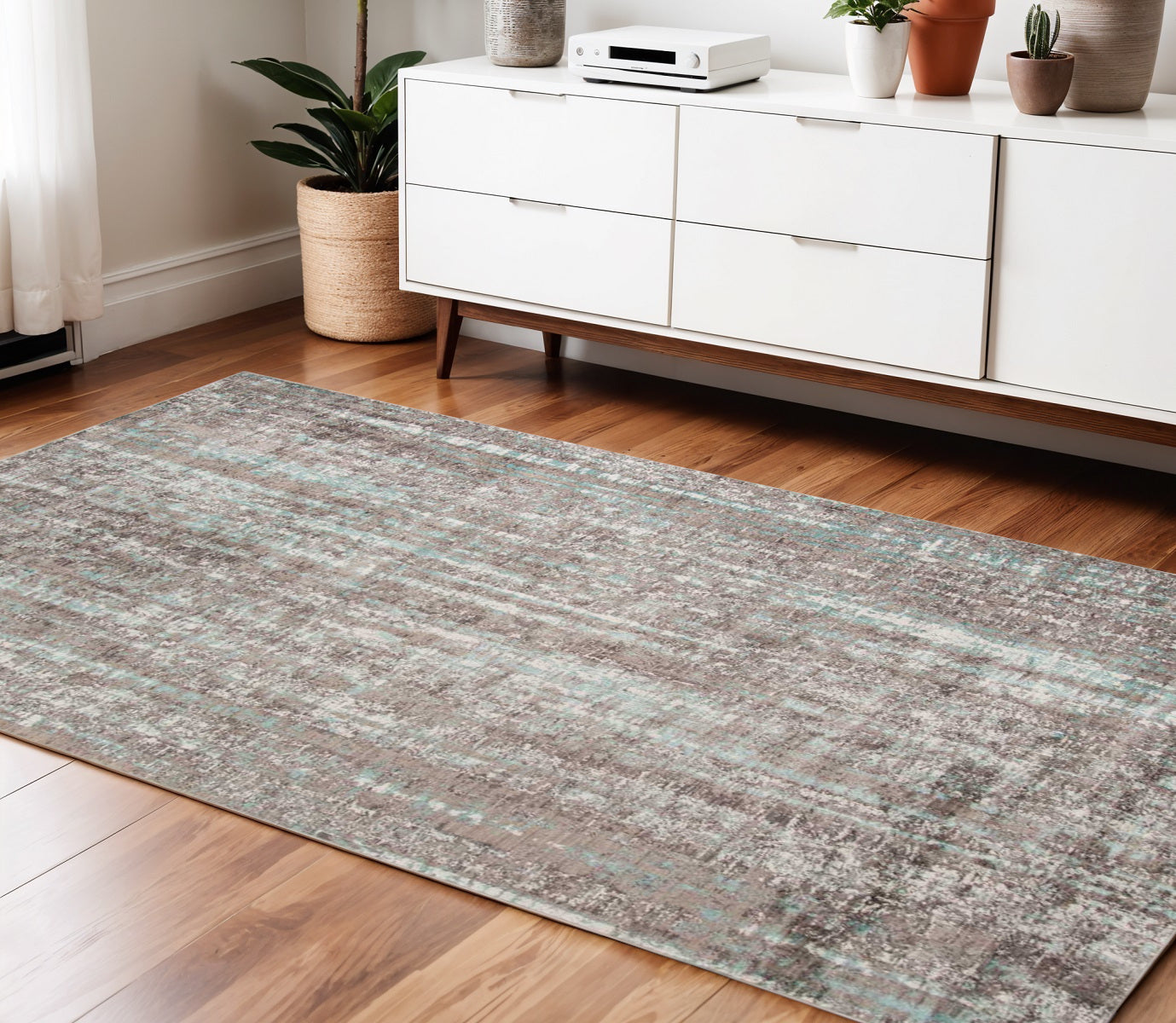 4' X 6' Ivory and Gray Abstract Power Loom Area Rug