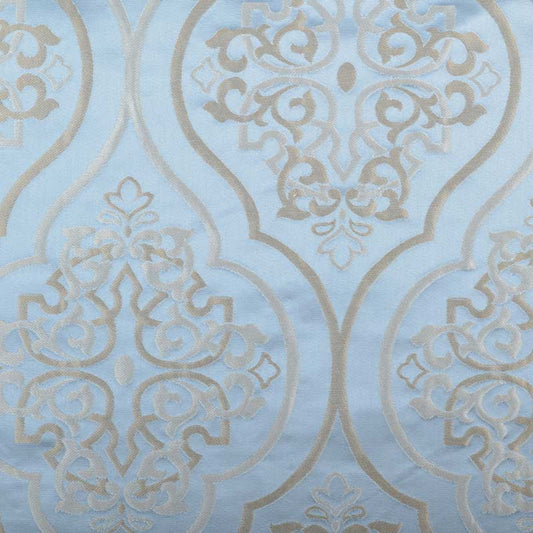 Light blue damask pattern with metallic beige scrollwork and ornate medallions; elegant wallpaper or fabric design.