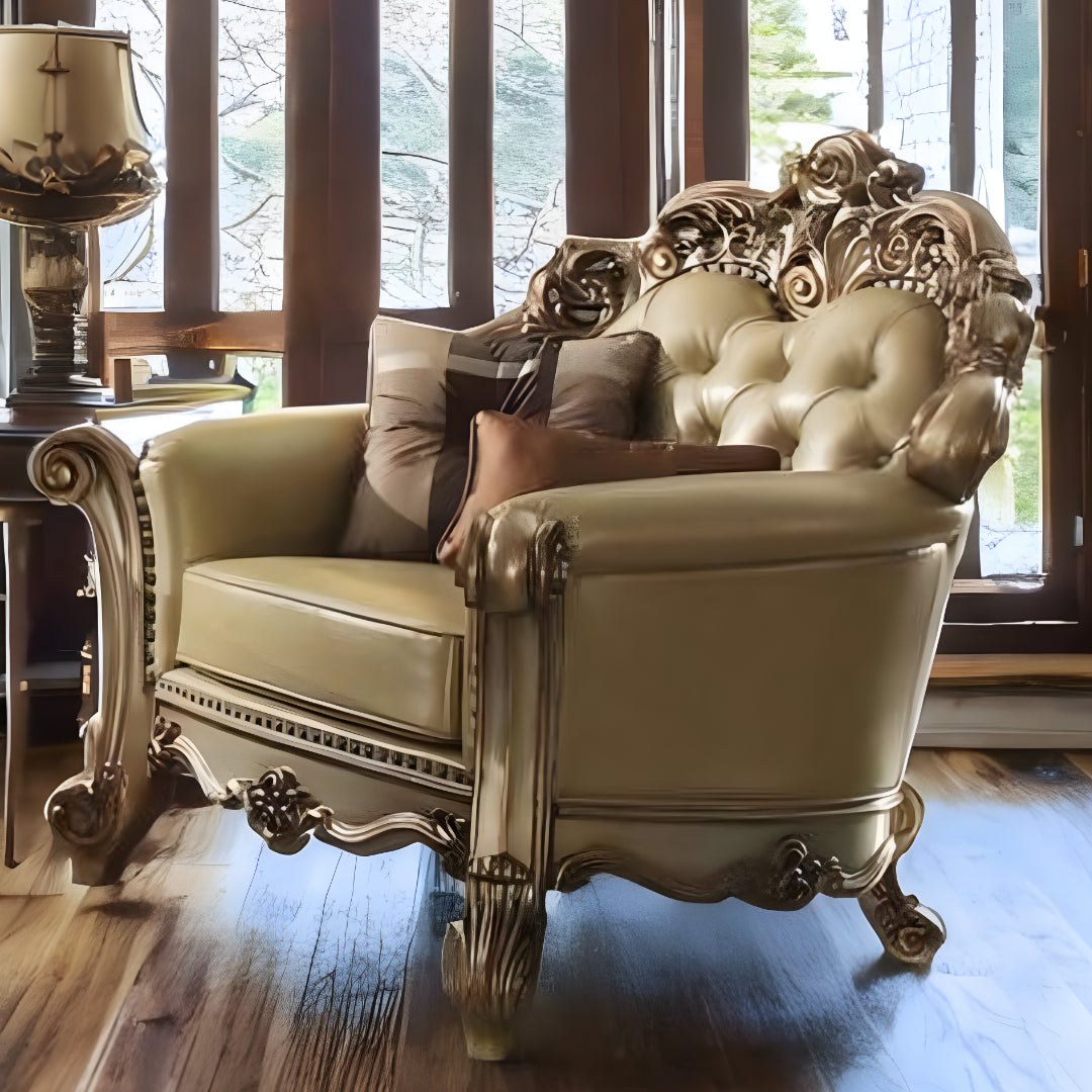 48" Bone And Gold Faux Leather Tufted Chair and a Half And Toss Pillows