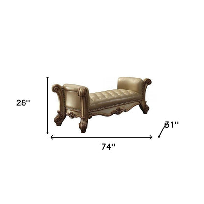 74" Bone And Gold Tufted Faux Leather Solid Wood And Polyresin Upholstered Bench