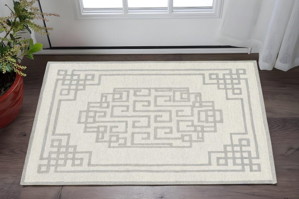 2' X 4' Gray And Ivory Wool Geometric Hand Tufted Area Rug
