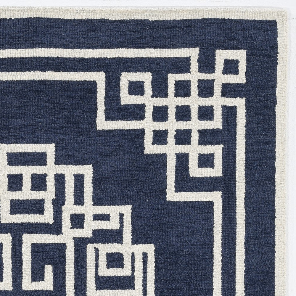 5' X 7' Navy Blue Ivory Hand Tufted Bordered Greek Key Indoor Area Rug