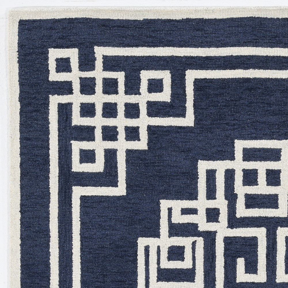 5' X 7' Navy Blue Ivory Hand Tufted Bordered Greek Key Indoor Area Rug