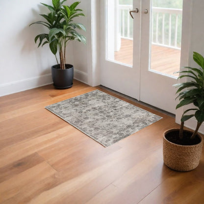 5' X 7' Beige Tan And Gold Abstract Hand Loomed Distressed Area Rug