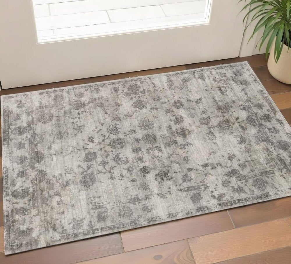 3' X 5' Beige And Blue Floral Medallion Hand Loomed Distressed Area Rug