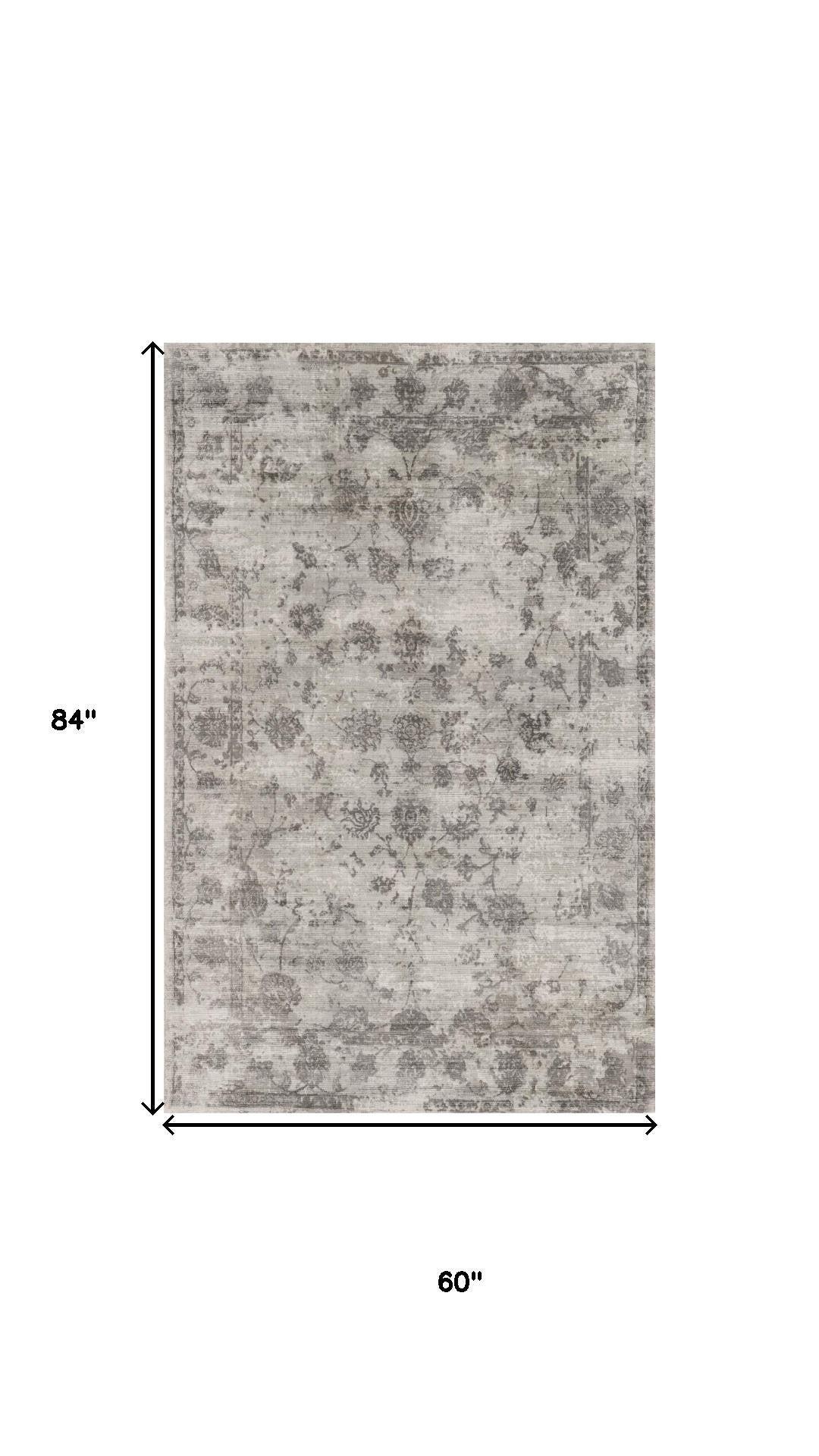 5' X 7' Beige Tan And Gold Abstract Hand Loomed Distressed Area Rug