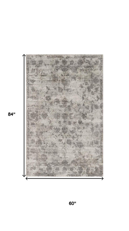 5' X 7' Beige Tan And Gold Abstract Hand Loomed Distressed Area Rug