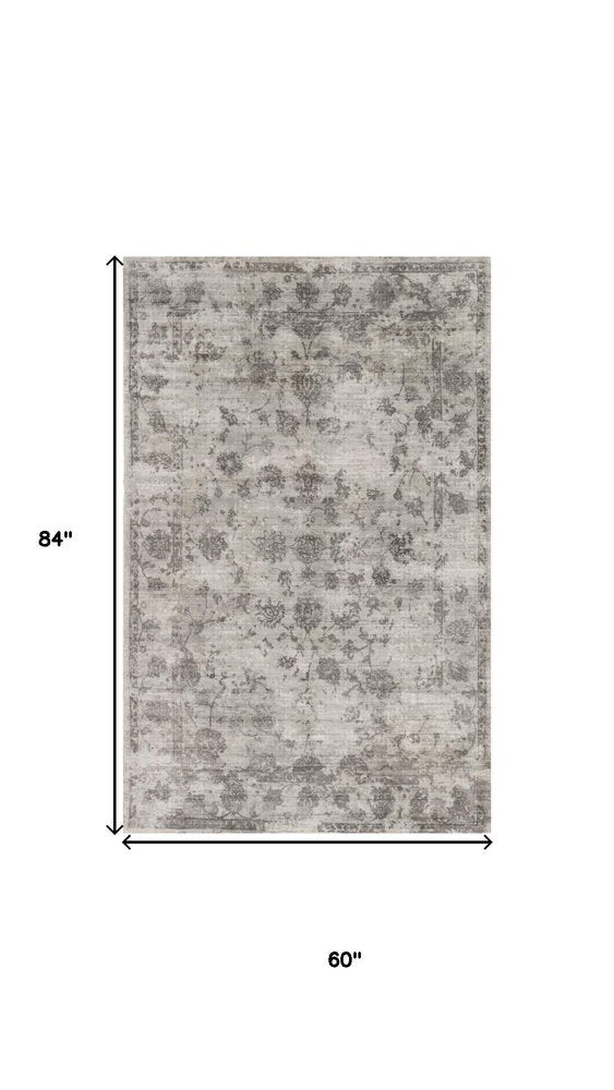 5' X 7' Beige Tan And Gold Abstract Hand Loomed Distressed Area Rug