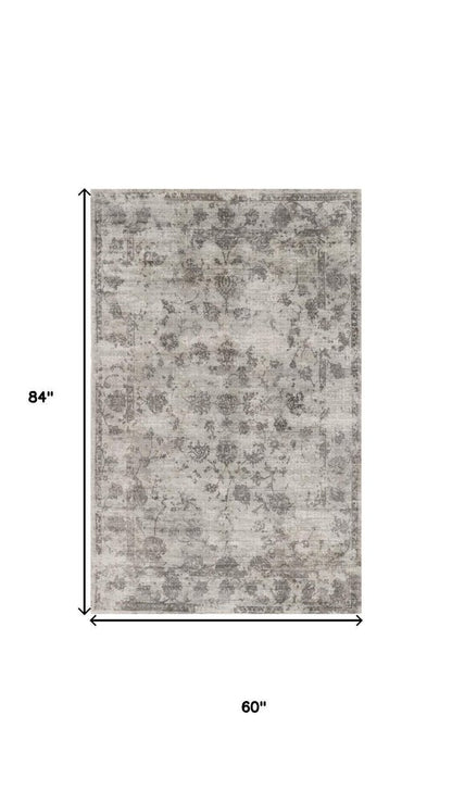 3' X 5' Beige And Blue Floral Medallion Hand Loomed Distressed Area Rug